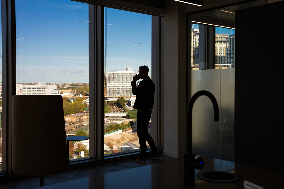 image of consultant on phone in West London office